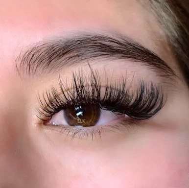 Designer wispy wet lash extensions Orange County - Natural glamorous wet look lashes professional OC salon
